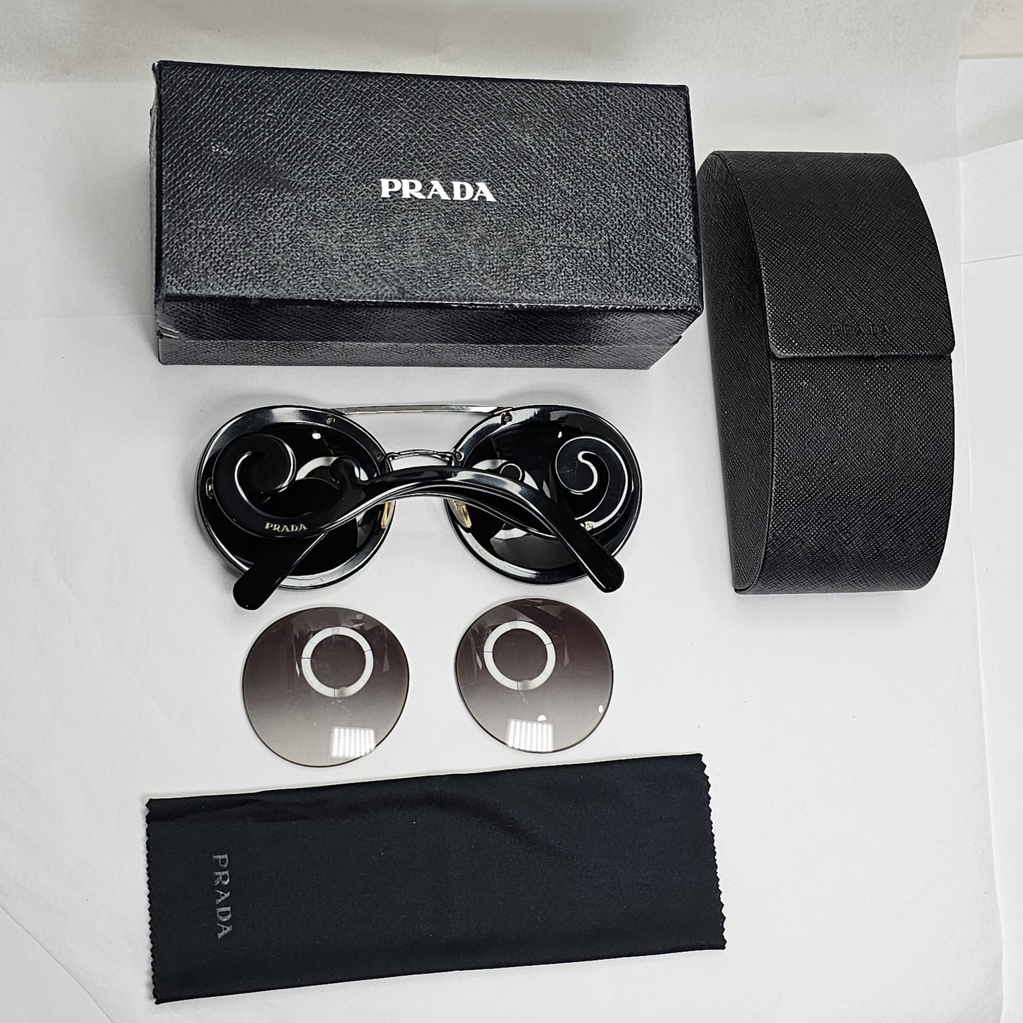 Prada Sunglasses Baroque Swirl Bridge Black Round PR13SS SPR 13S 1AB-0A7 120124
