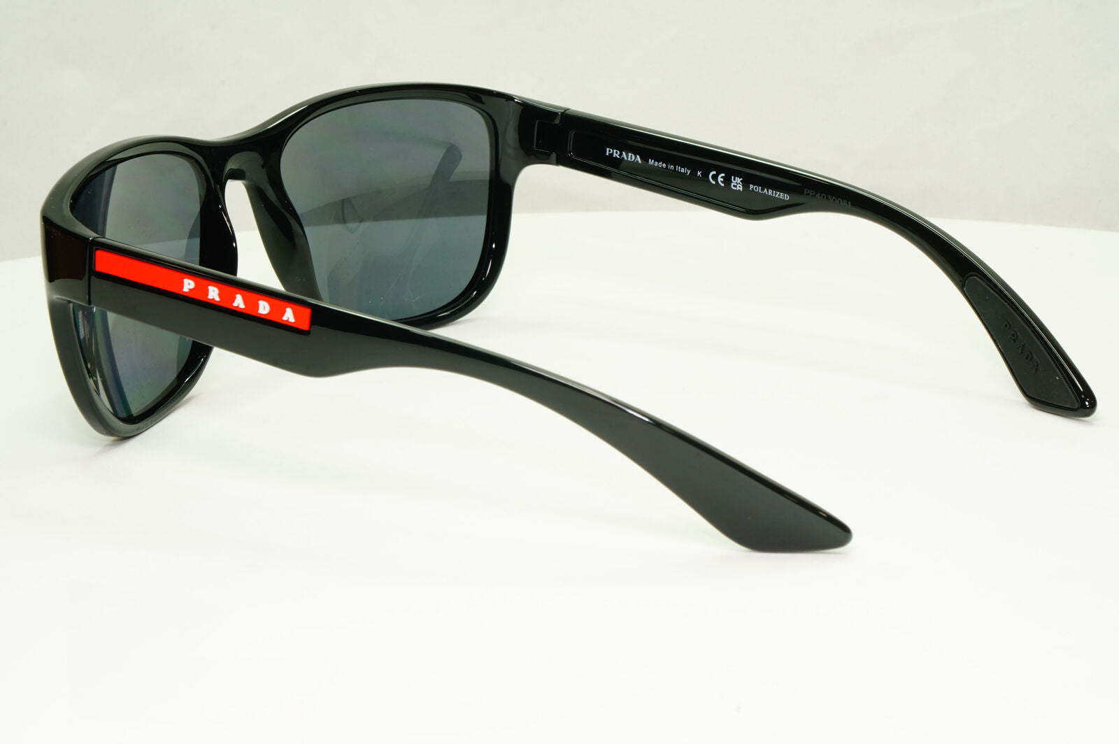 Prada Polarised Black Sunglasses Square Red Stripe PS01US SPS 01U 1AB-5Z1 59mm