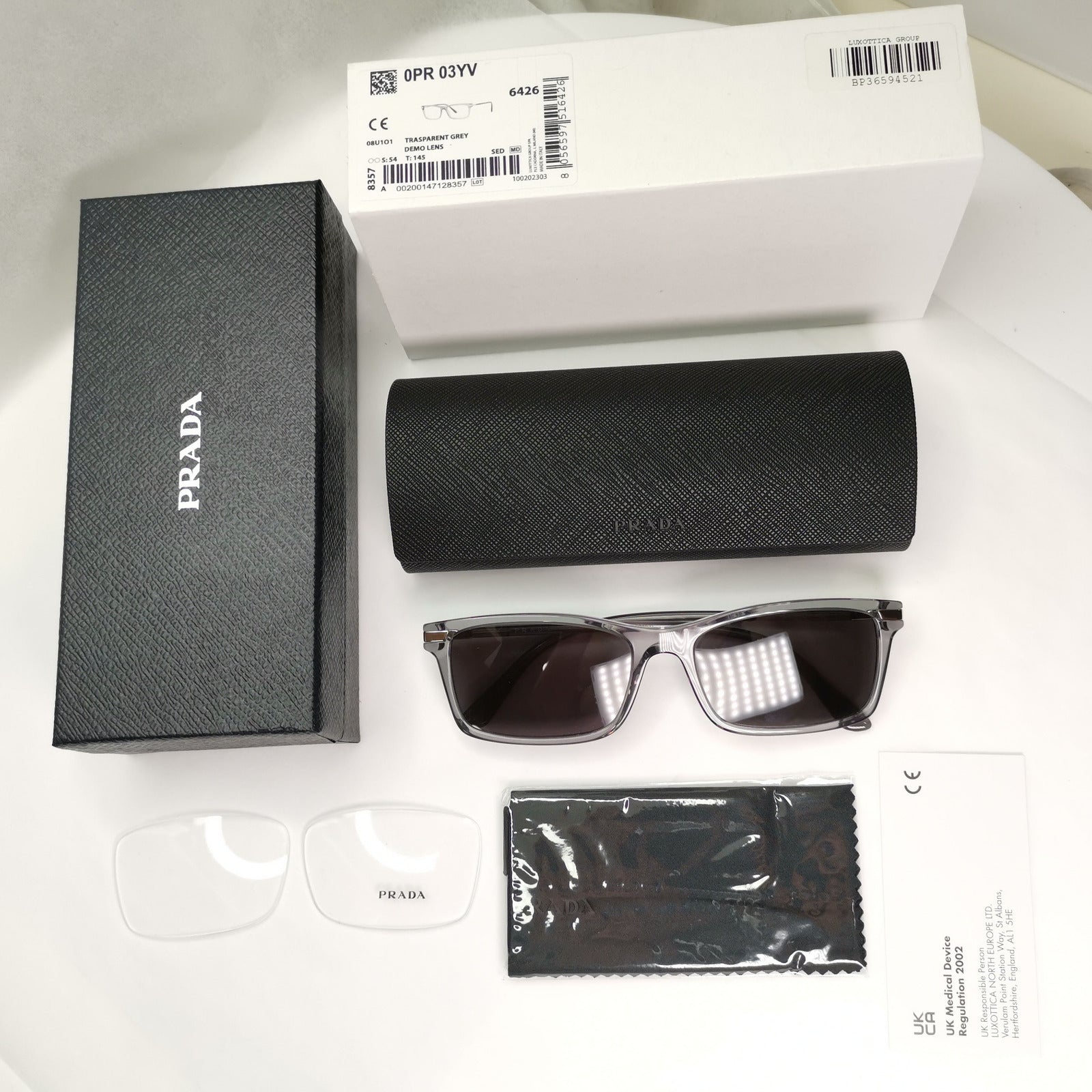 Prada Sunglasses Transparent Grey Crystal Black PR03YV VPR 03Y 08U-1O1 54mm