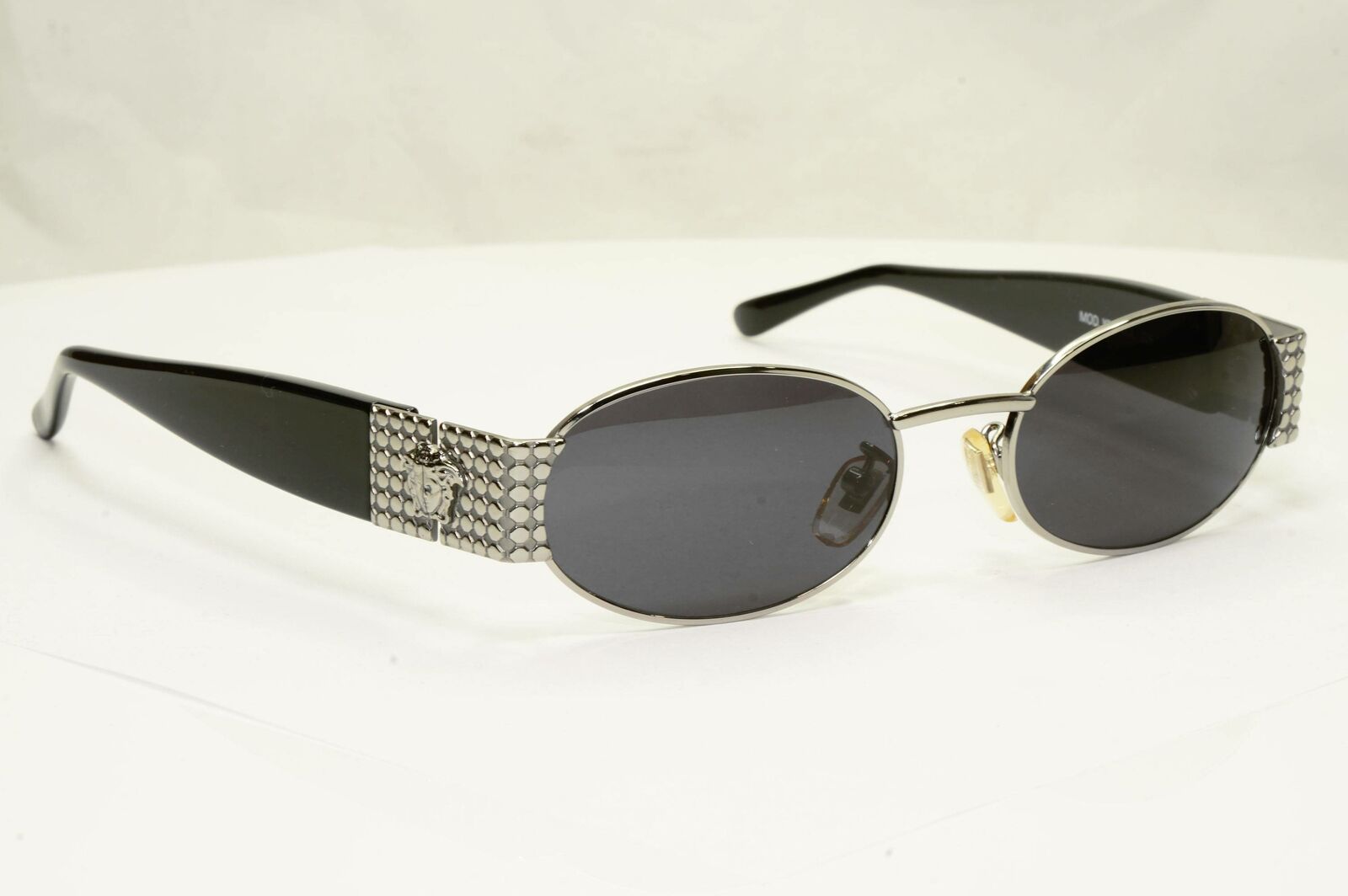 Gianni Versace 1996 Vintage Silver Medusa Black Oval Sunglasses MOD X38 COL 029