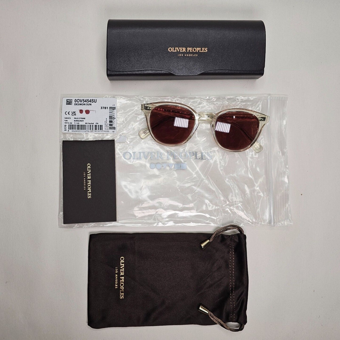 Oliver Peoples Desmon Sunglasses Transparent Yellow Bordo OV 5454SU 1692/C5 50mm