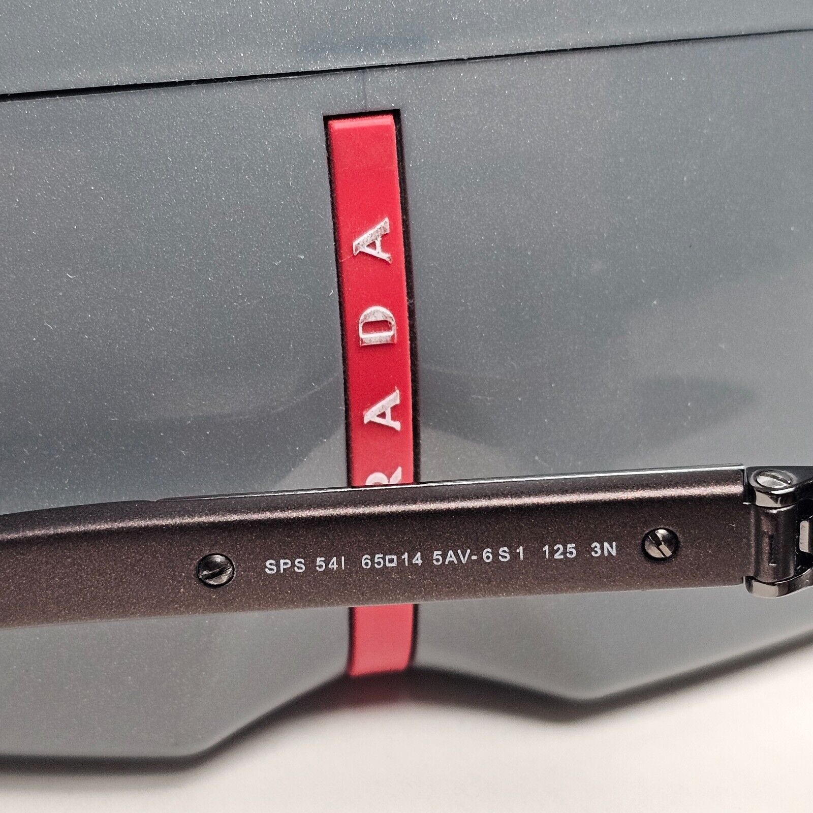 Prada Sunglasses Brown Gunmetal Wrap Navigator PS54IS SPS 54I 5AV-6S1 231124