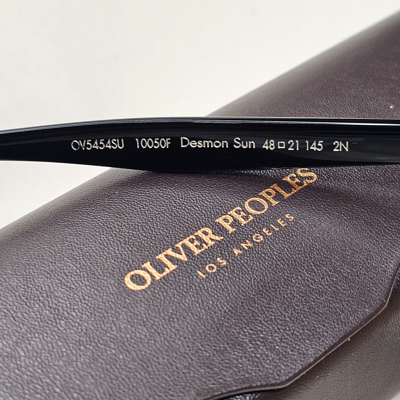 Oliver Peoples Desmon Sunglasses Black Yellow Mustard OV 5454SU 1005/0F 48mm