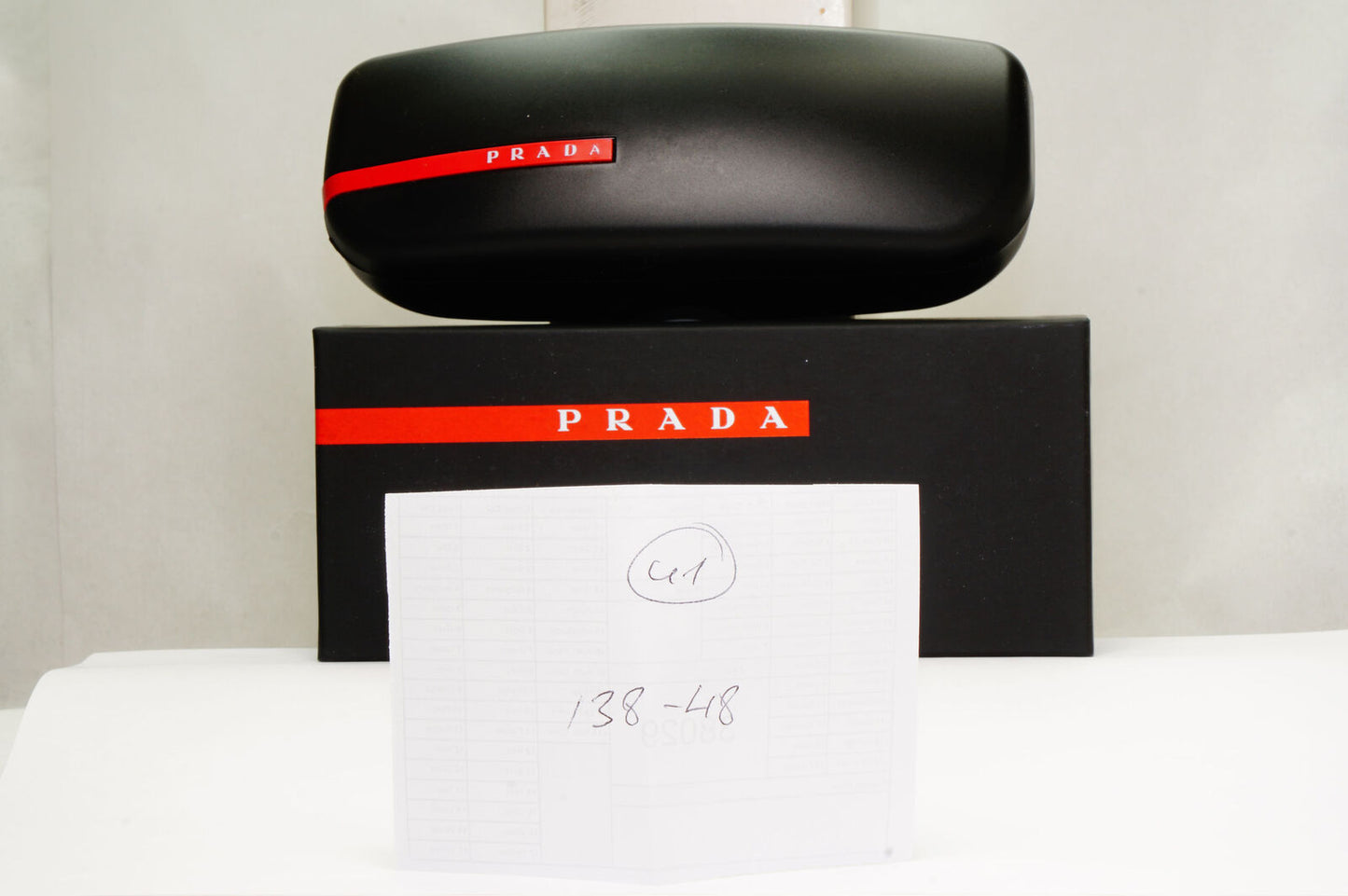Prada Sunglasses Black Round Matte Rubber Red Stripe PS01NV VPS 01N DG0-1O1 50mm