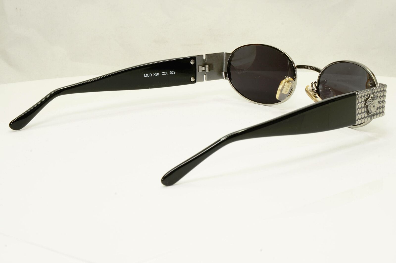 Gianni Versace 1996 Vintage Silver Medusa Black Oval Sunglasses MOD X38 COL 029