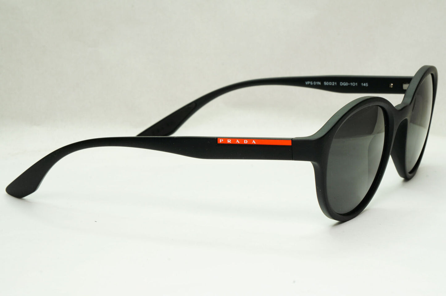 Prada Sunglasses Black Round Matte Rubber Red Stripe PS01NV VPS 01N DG0-1O1 50mm