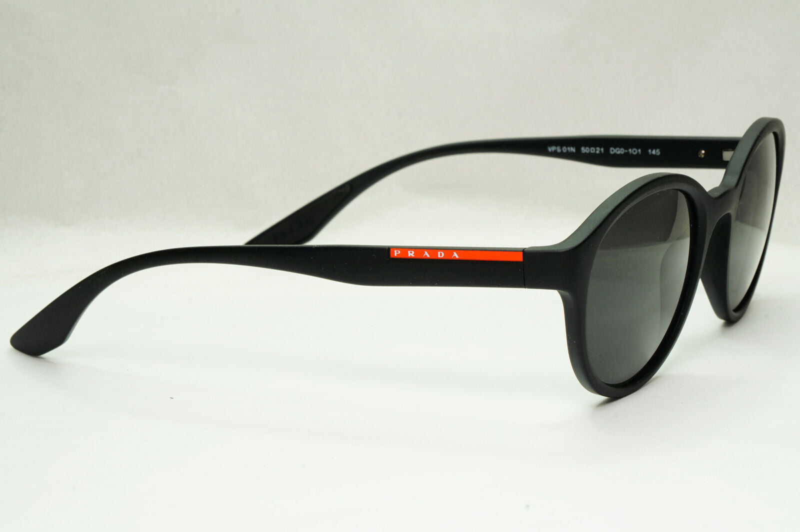 Prada Sunglasses Black Round Matte Rubber Red Stripe PS01NV VPS 01N DG0-1O1 50mm