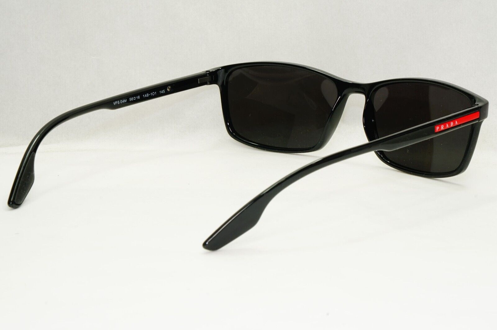 Prada Sunglasses Black Rectangle Glossy Red Stripe PS04MV VPS 04M 1AB-1O1 56mm