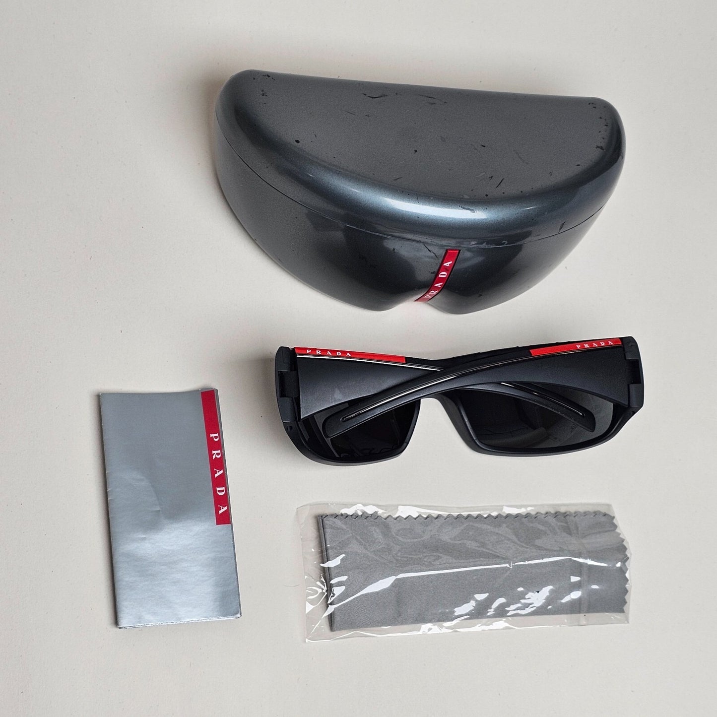 Prada Sunglasses Black Mattw Wrap Red Stripe PS01LS SPS 01L 1BO-1A1 130225