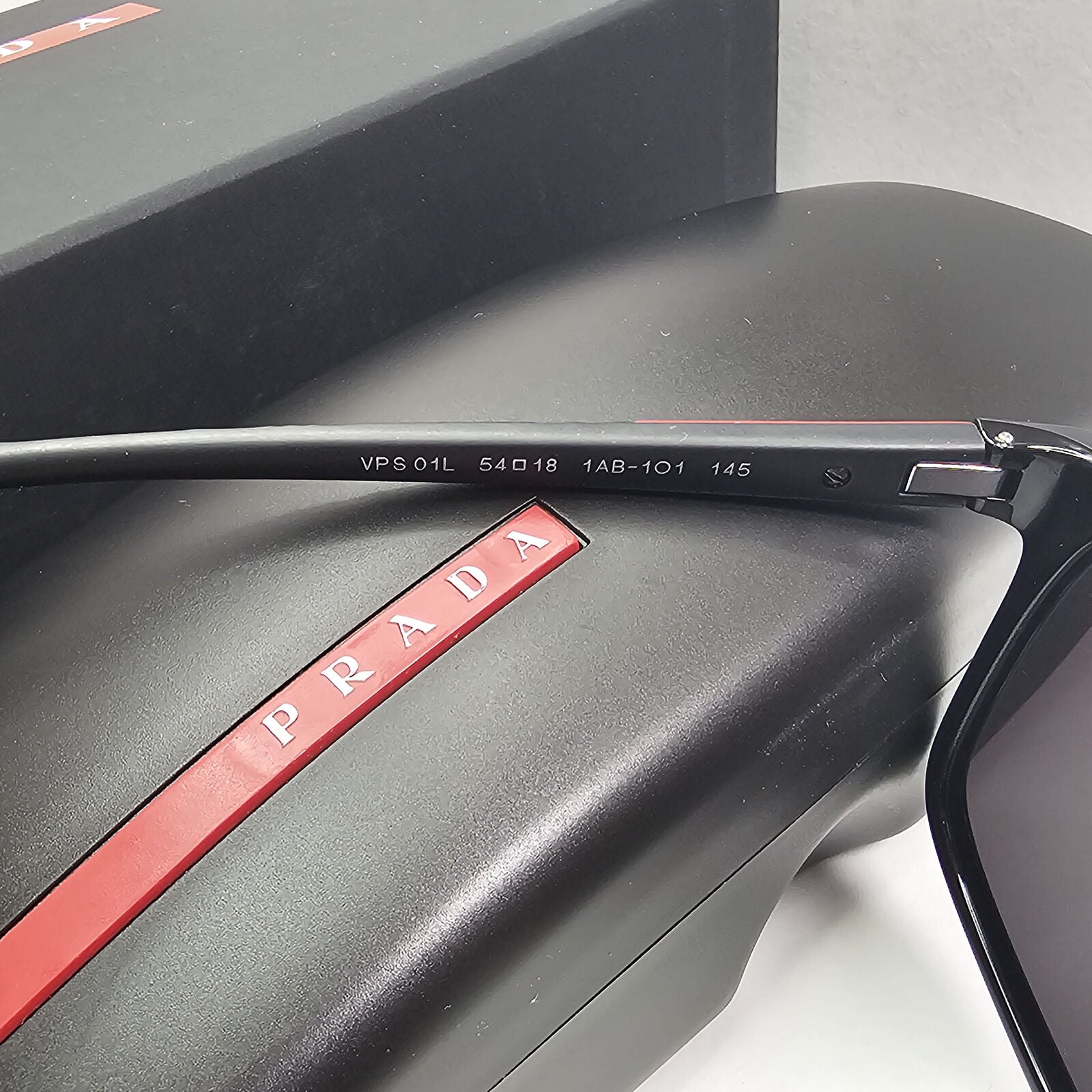 Prada Sunglasses Black Square Glossy Red Stripe PS01LV VPS 01L 1AB-1O1 54mm