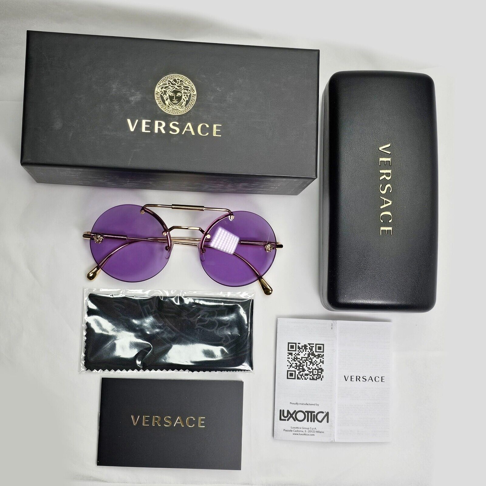 Versace Sunglasses Gold Round Rimless Medusa Violet MOD VE 2244 1002/69 56mm