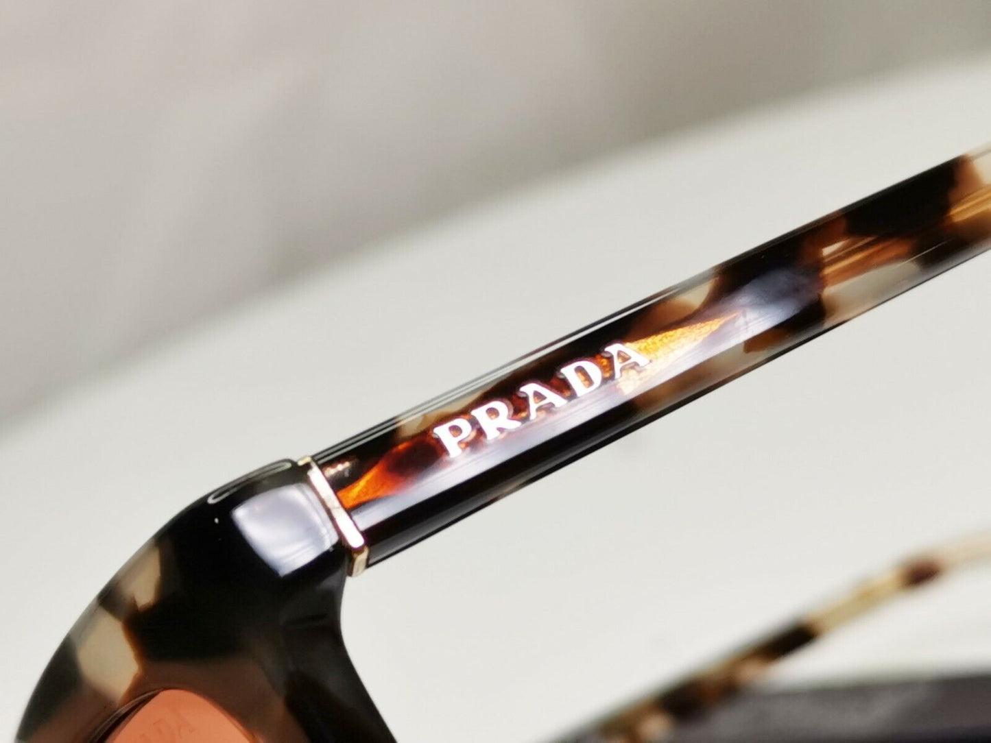 Prada Brown Tortoise Shell Womens Sunglasses Ultravox SPR 03X SF UA0-2F1 Turtle