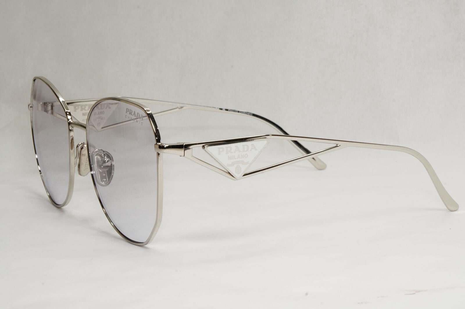 Prada Sunglasses Photochromic Grey Silver Triangle PR57YS SPR 57Y 1BC-07D