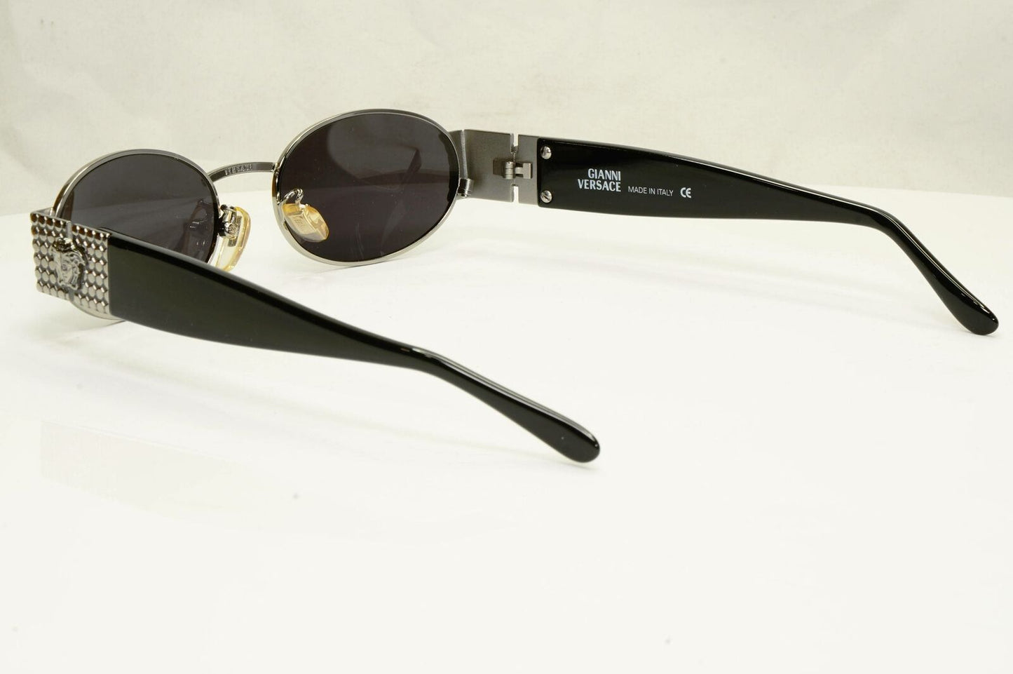 Gianni Versace 1996 Vintage Silver Medusa Black Oval Sunglasses MOD X38 COL 029