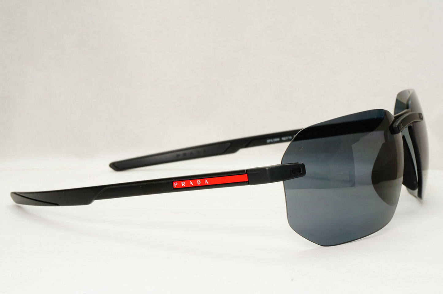 Prada Sunglasses Polarized Wrap Rimless Black PS09WS SPS 09W DG0-02G 62mm