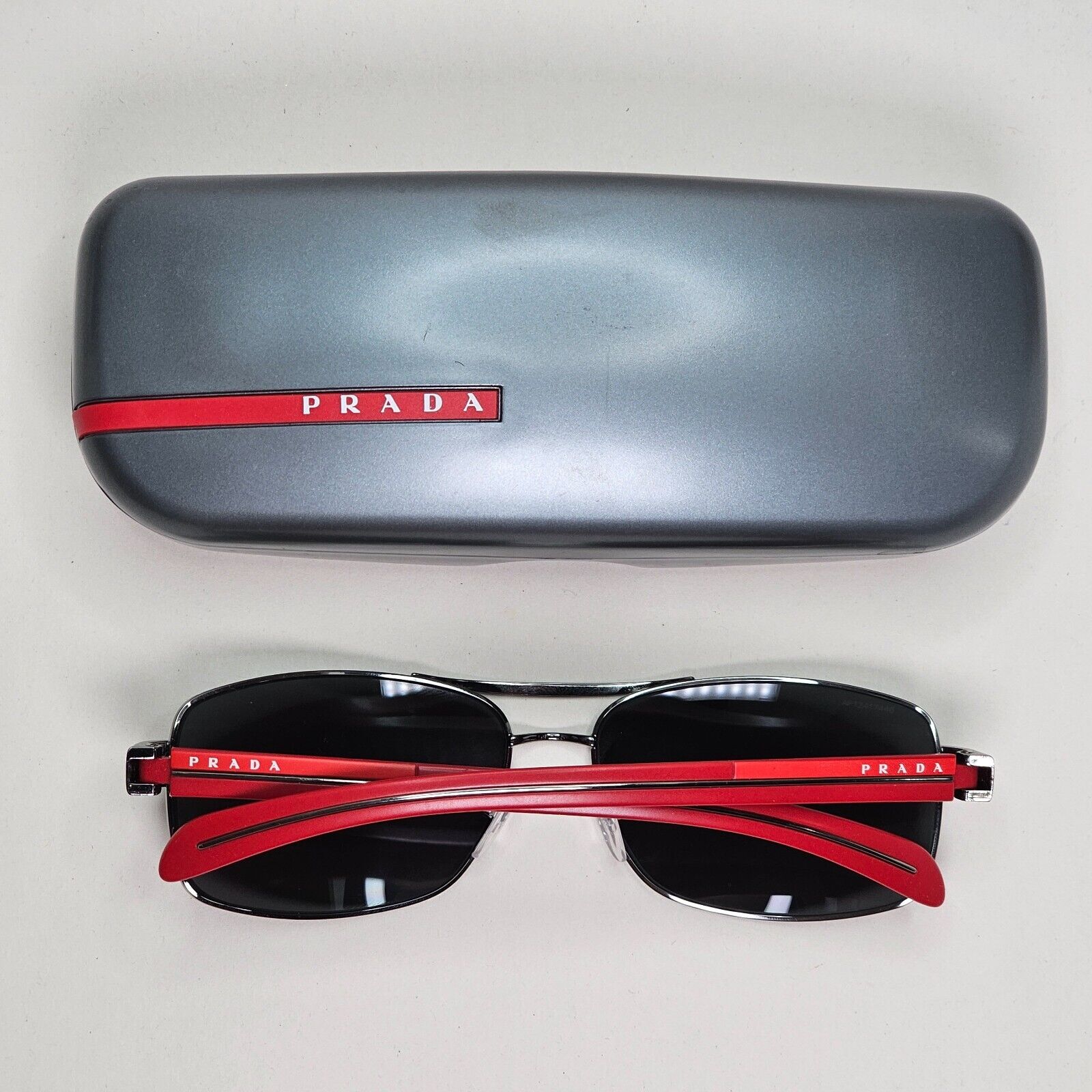 Prada Sunglasses 2010 Vintage Gunmetal Red Grey PS50LS SPS 50L 5AV-1A1 151024