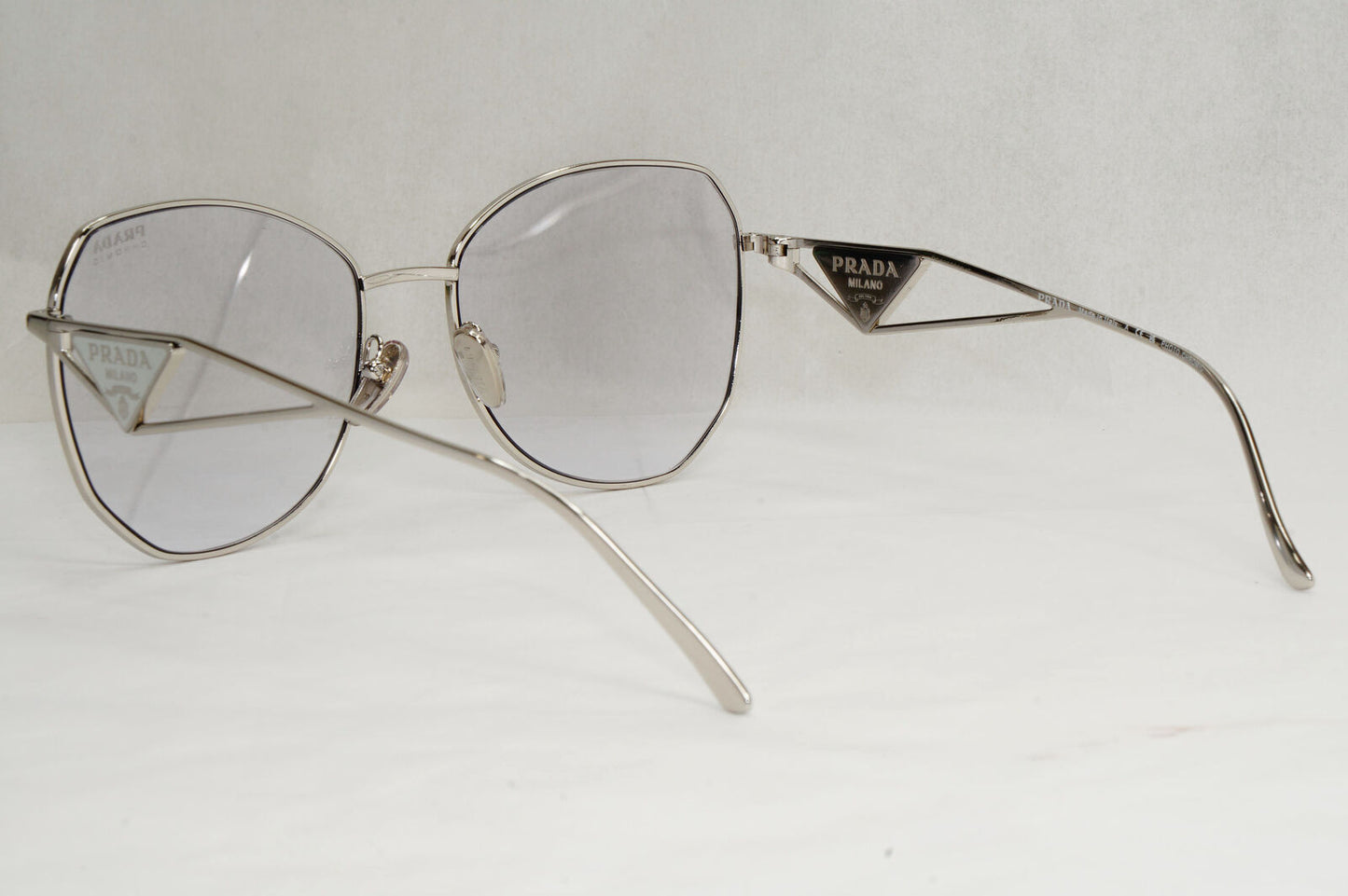 Prada Sunglasses Photochromic Grey Silver Triangle PR57YS SPR 57Y 1BC-07D