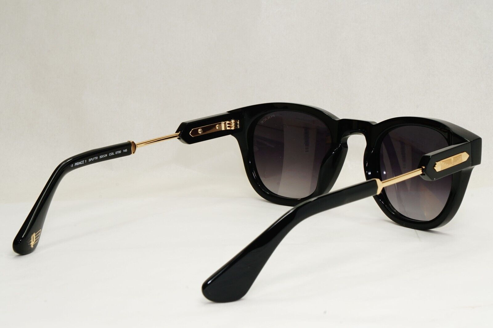 Police Sunglasses Black Gold Grey Gradient Thick Rim SPL F70 Prince 1 COL 0700