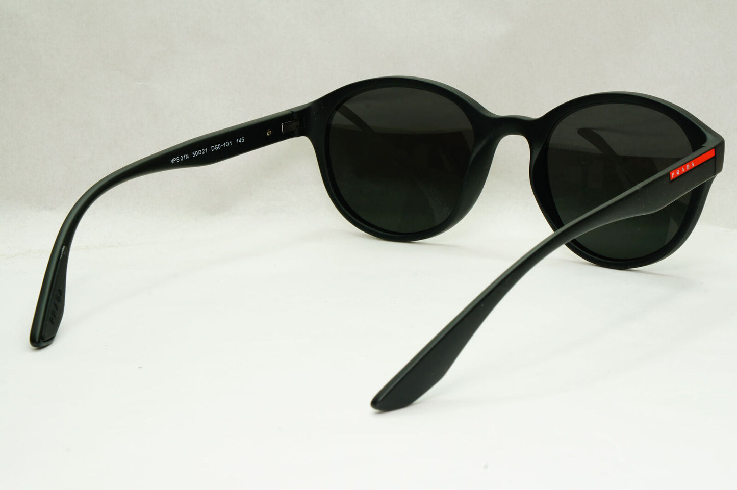Prada Sunglasses Black Round Matte Rubber Red Stripe PS01NV VPS 01N DG0-1O1 50mm