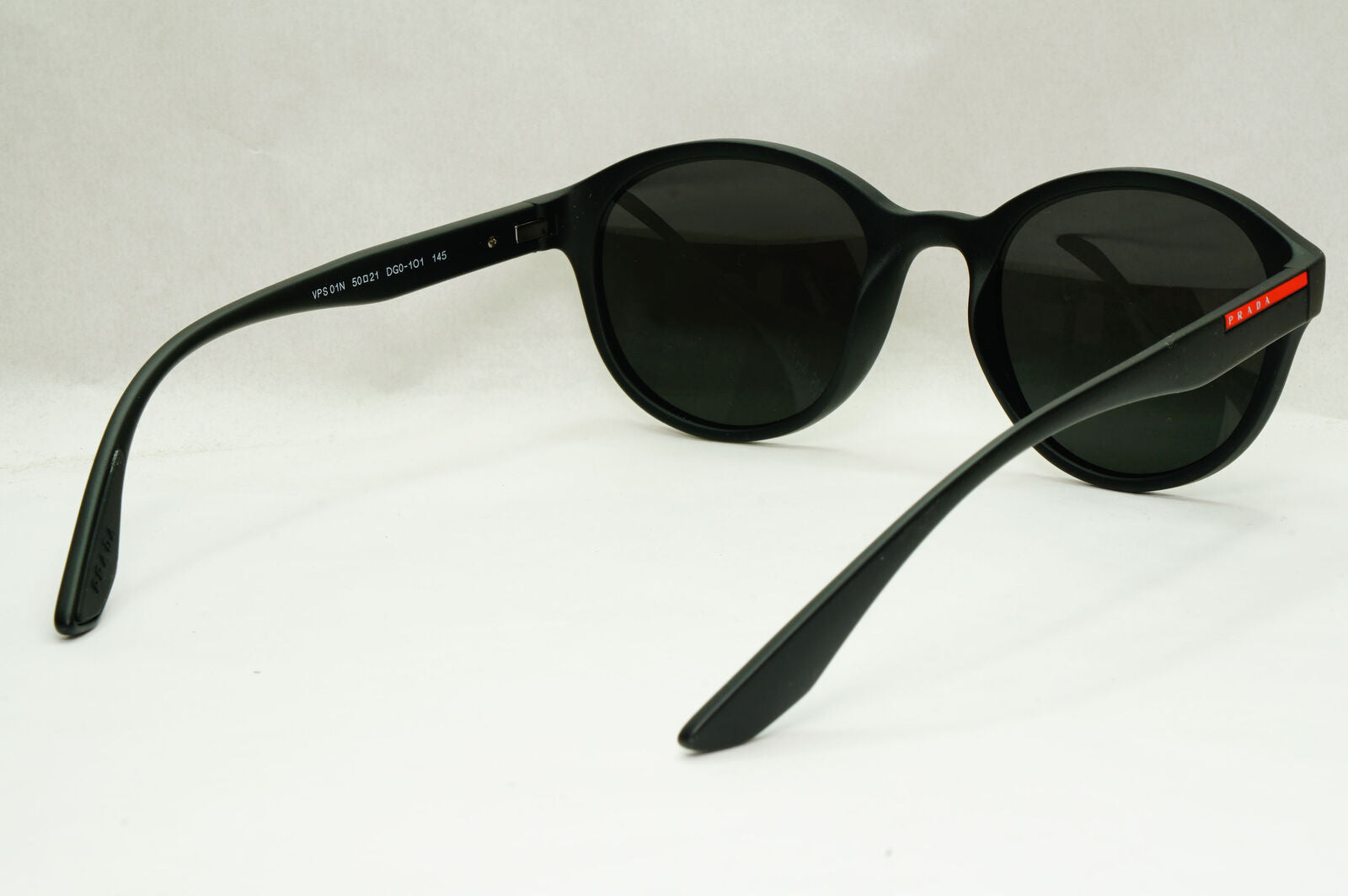 Prada Sunglasses Black Round Matte Rubber Red Stripe PS01NV VPS 01N DG0-1O1 50mm