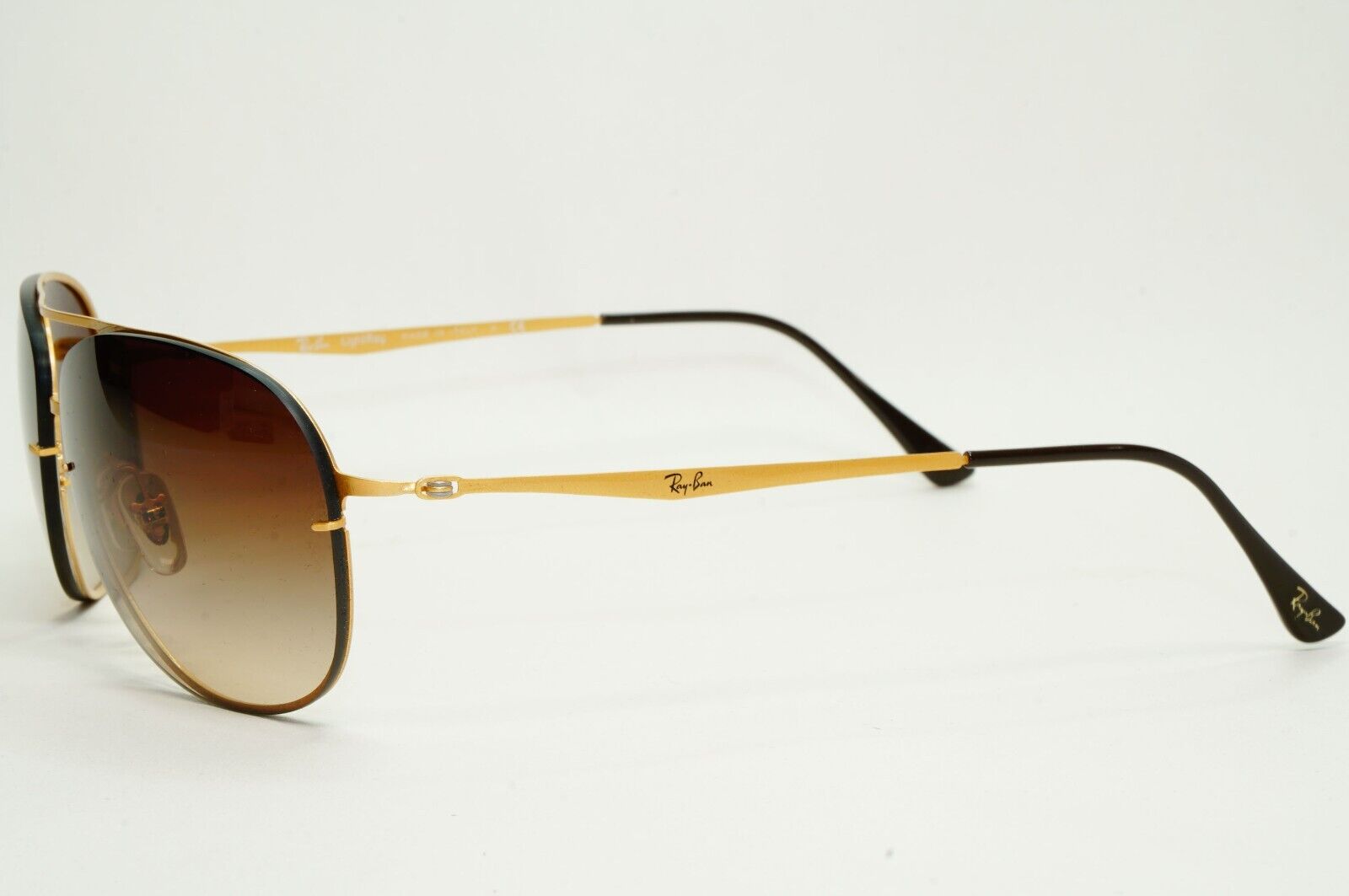 Ray-Ban Sunglasses Titan Ultra Lighweight Rimless Gold Brown RB 8052 157/13 61mm