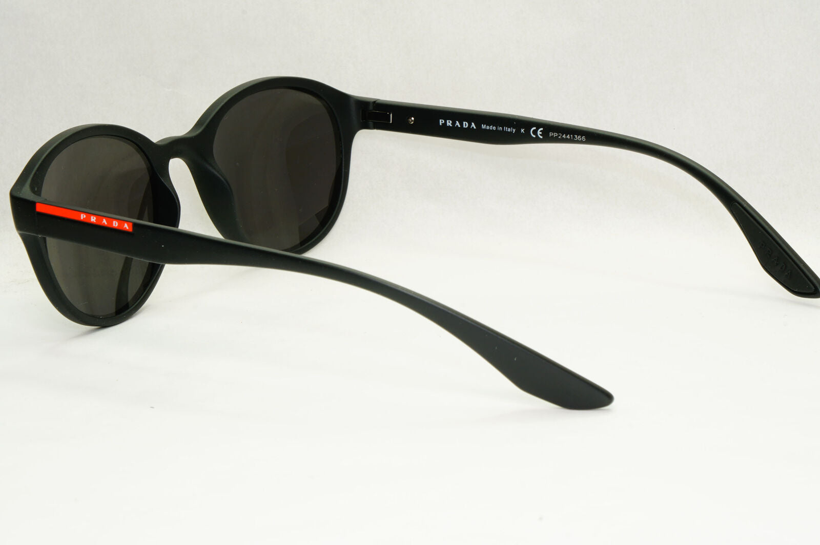 Prada Sunglasses Black Round Matte Rubber Red Stripe PS01NV VPS 01N DG0-1O1 50mm