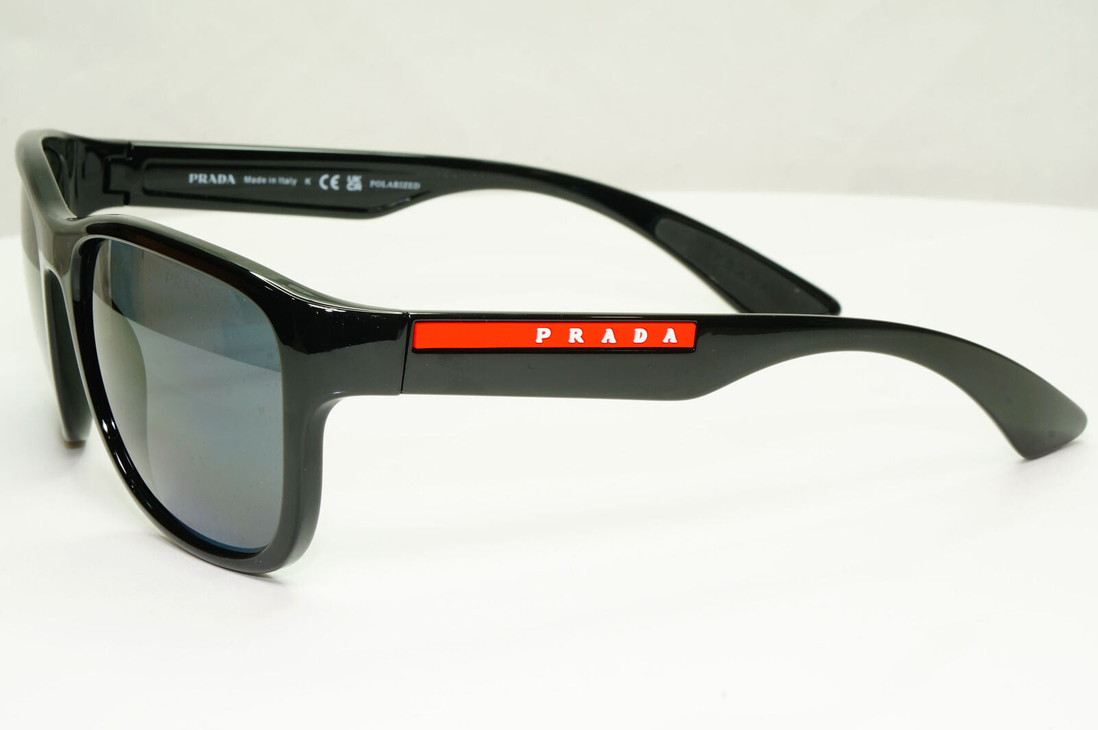 Prada Polarised Black Sunglasses Square Red Stripe PS01US SPS 01U 1AB-5Z1 59mm