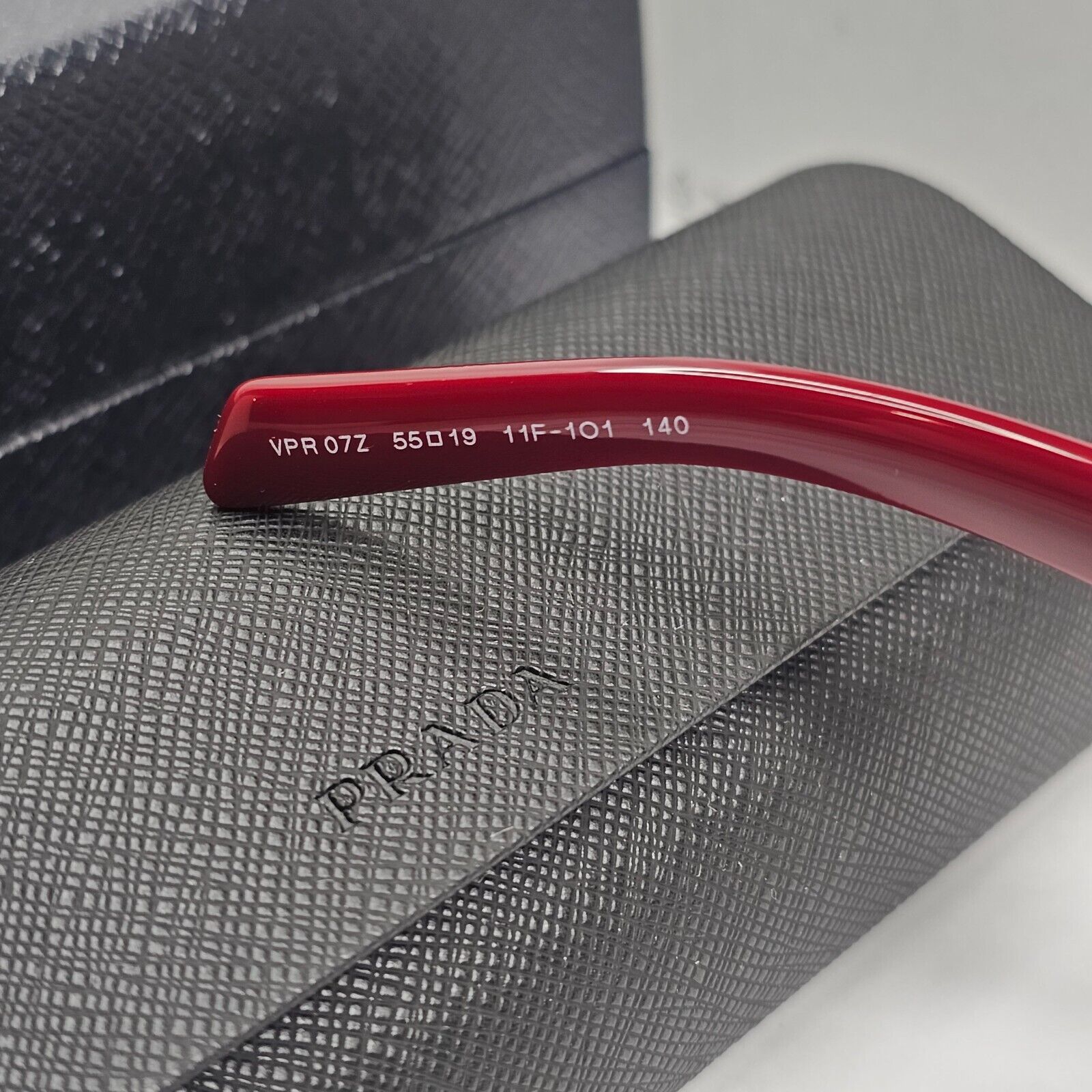 Prada Sunglasses Triangle Symbole Red Black Marble PR07ZV VPR 07Z 11F-1O1 55mm