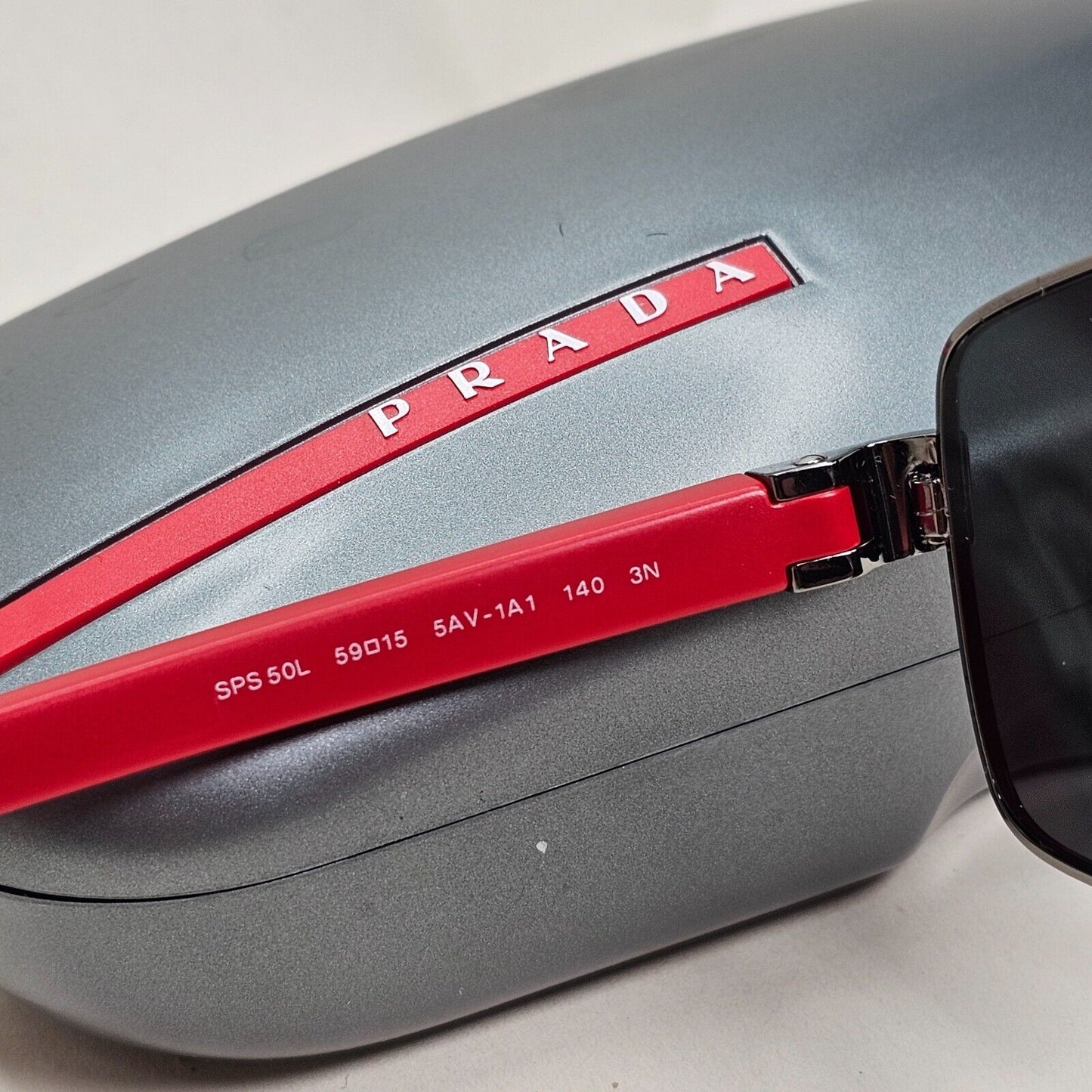 Prada Sunglasses 2010 Vintage Gunmetal Red Grey PS50LS SPS 50L 5AV-1A1 151024