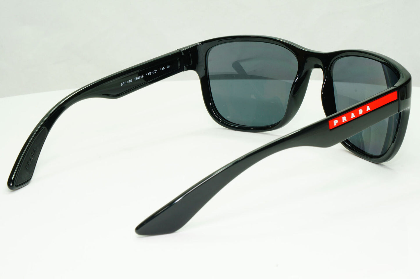 Prada Polarised Black Sunglasses Square Red Stripe PS01US SPS 01U 1AB-5Z1 59mm