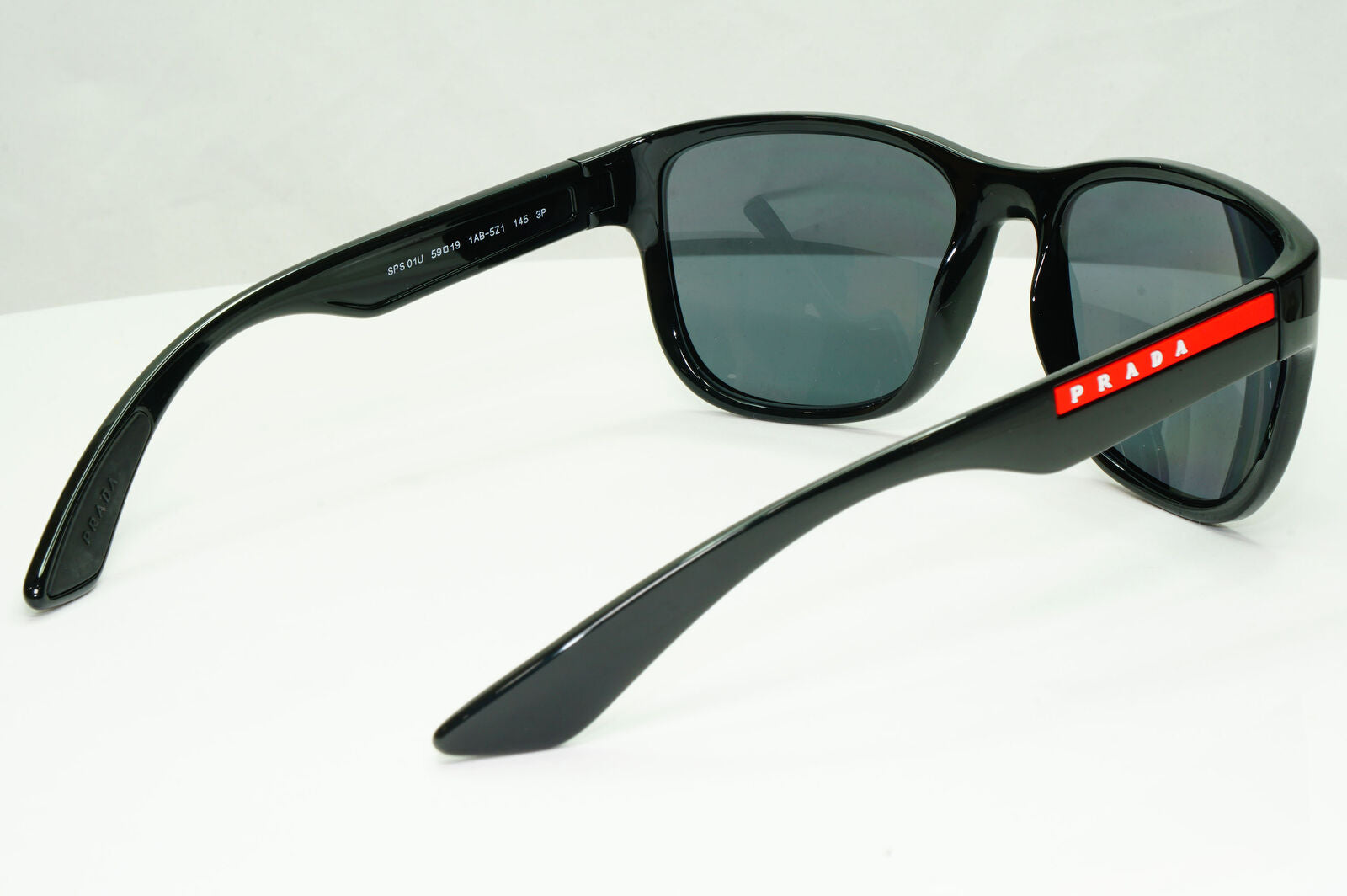 Prada Polarised Black Sunglasses Square Red Stripe PS01US SPS 01U 1AB-5Z1 59mm