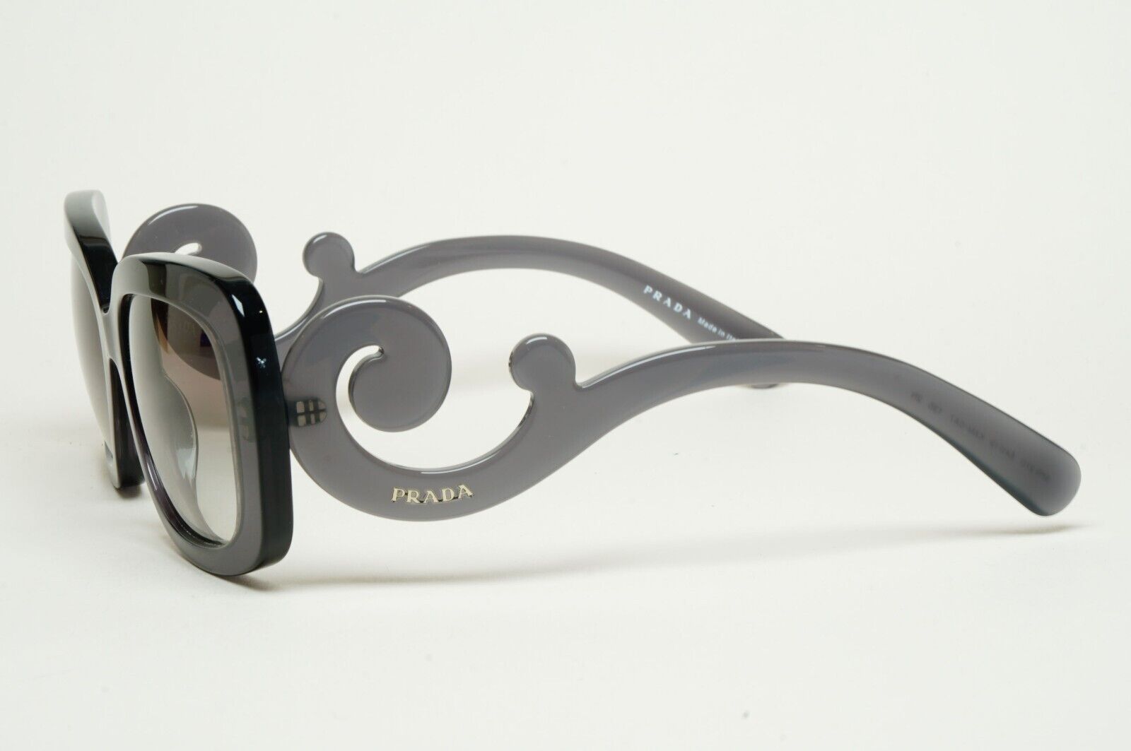 Prada Sunglasses Baroque Swirl Grey Transparent PR27OS SPR 27O KAM-0A7 250125