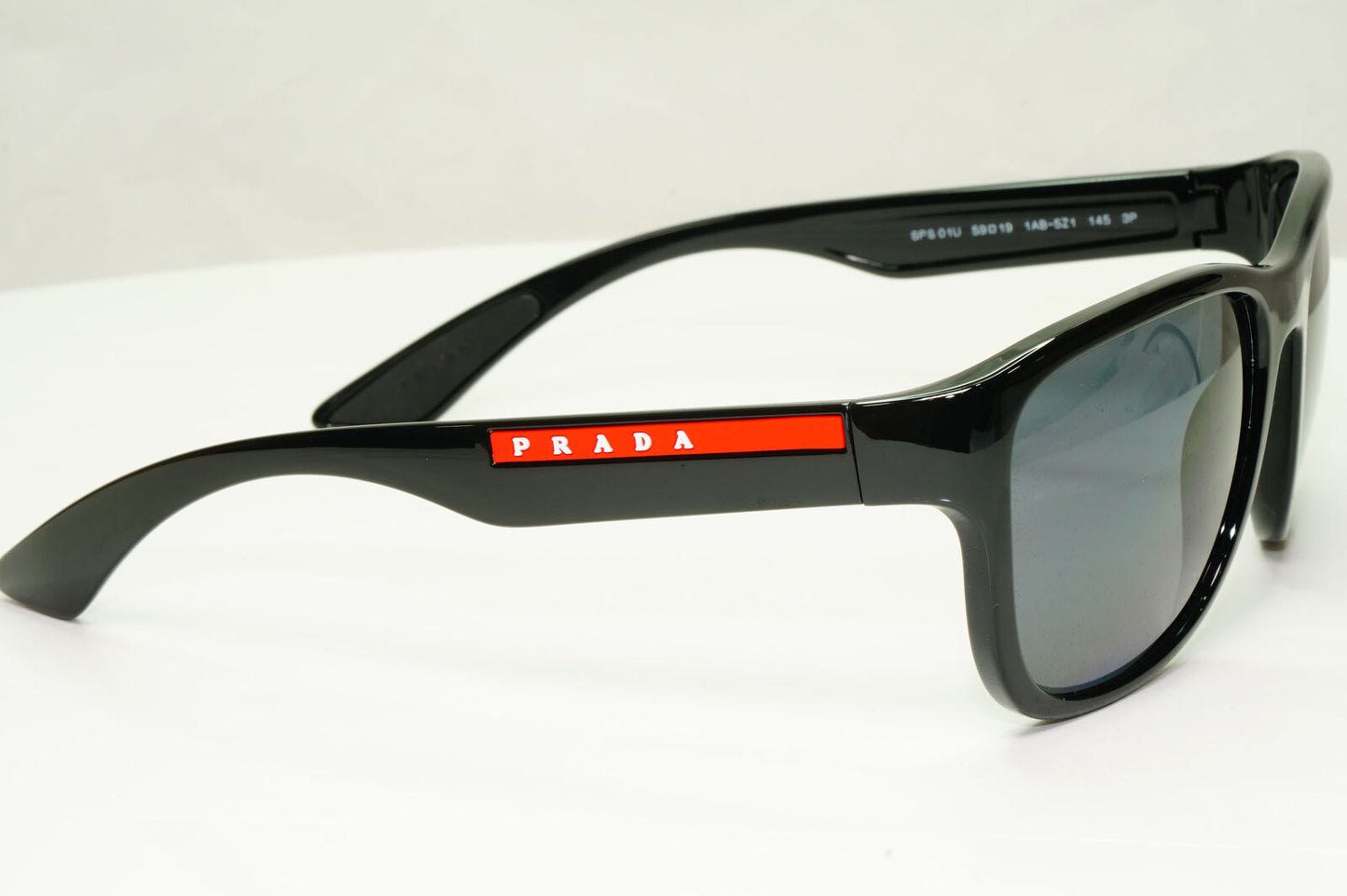 Prada Polarised Black Sunglasses Square Red Stripe PS01US SPS 01U 1AB-5Z1 59mm