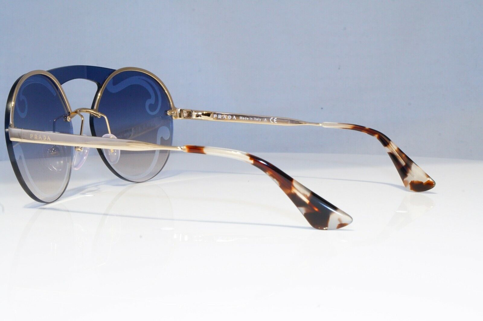 Prada Baroque Swirl Sunglasses Gold Blue Gradient Metal Round SPR 65T ZVN-0D0