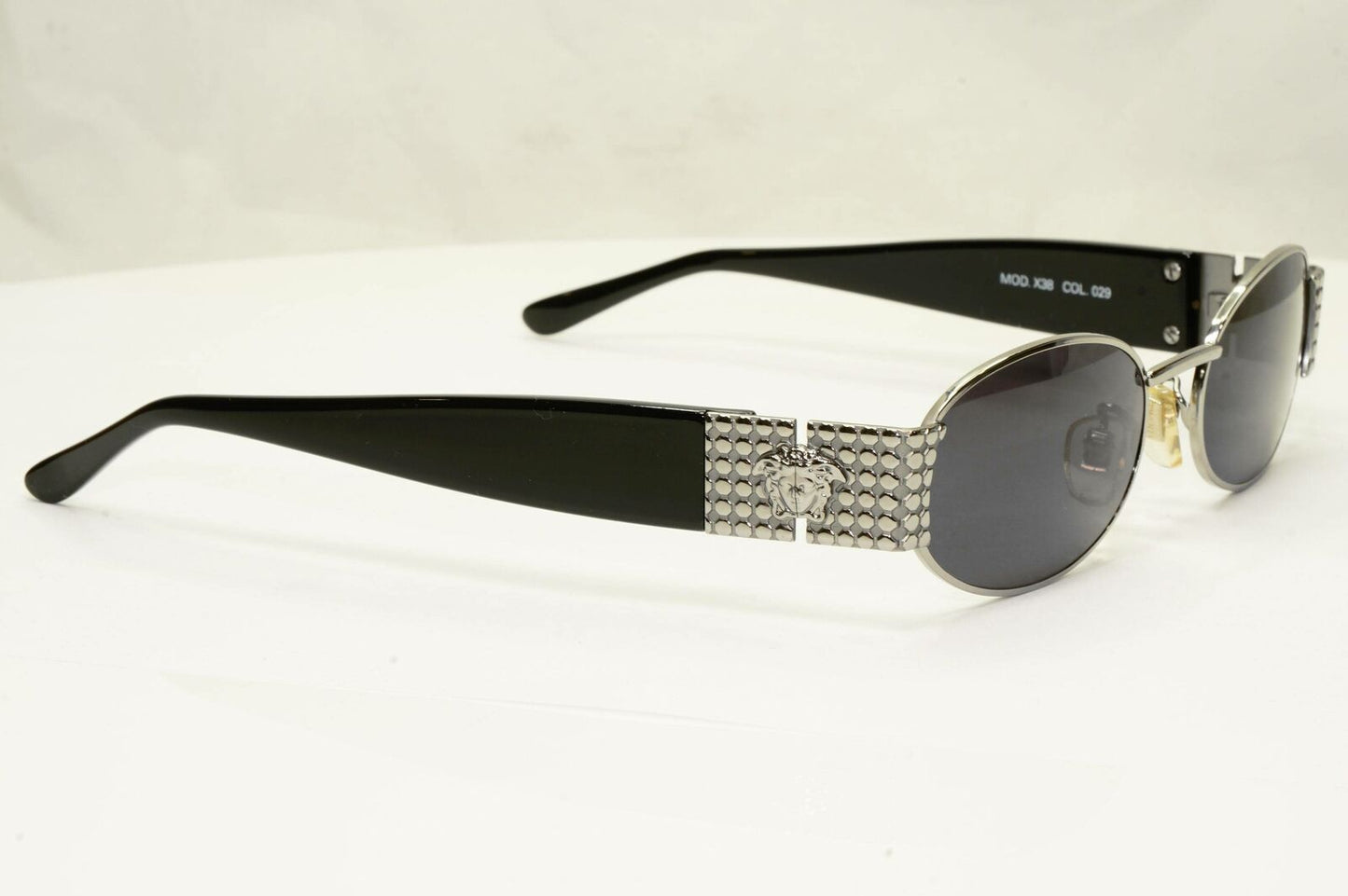 Gianni Versace 1996 Vintage Silver Medusa Black Oval Sunglasses MOD X38 COL 029