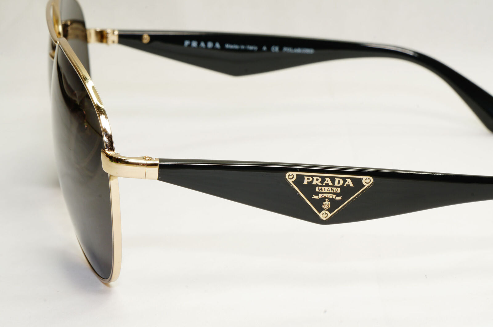 Prada Sunglasses Triangle Logo Black Gold Pilot PR53QS SPR 53Q ZVN-5Z1 130224