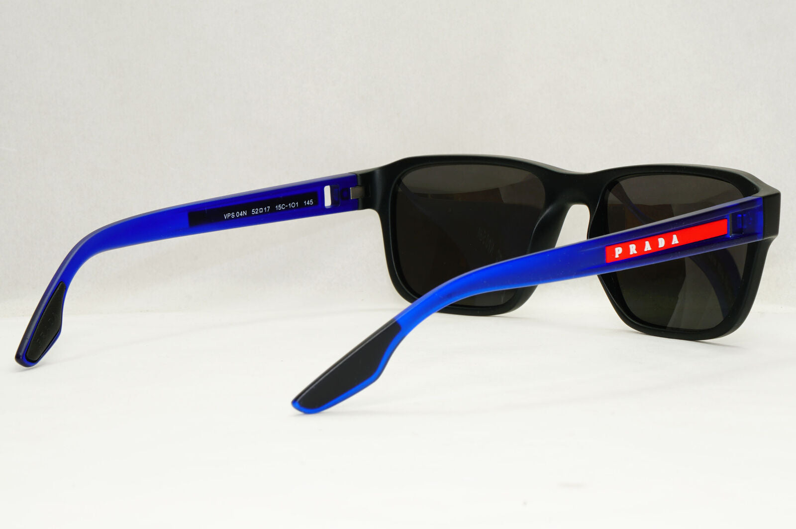 Prada Sunglasses Black Blue Rubber Square Red Stripe PS04NV VPS 04N 15C-1O1 52mm