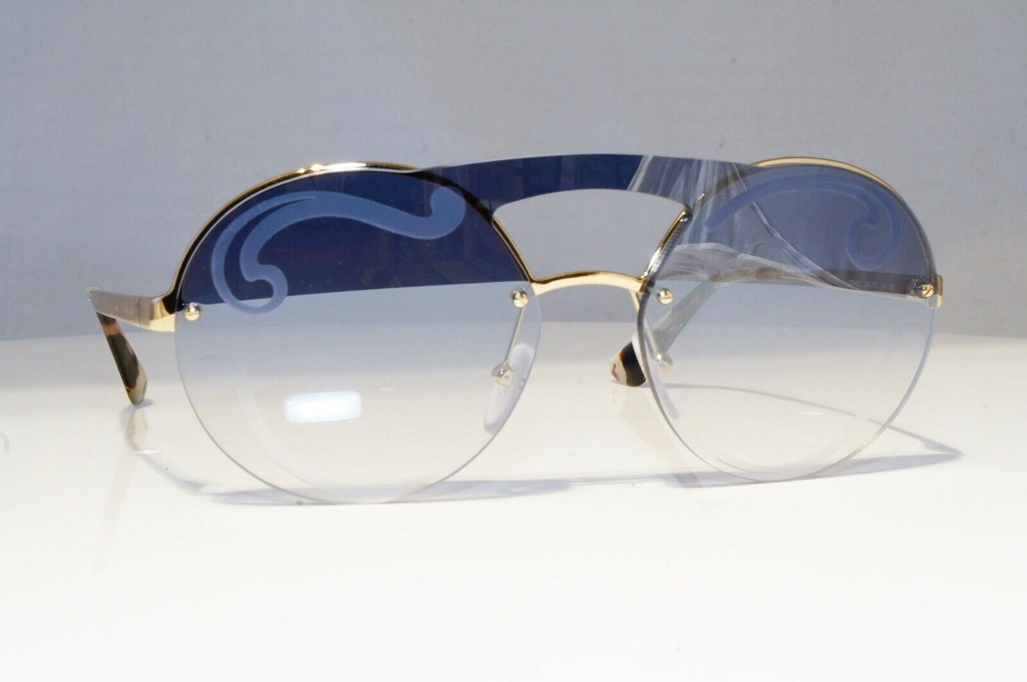 Prada Baroque Swirl Sunglasses Gold Blue Gradient Metal Round SPR 65T ZVN-0D0