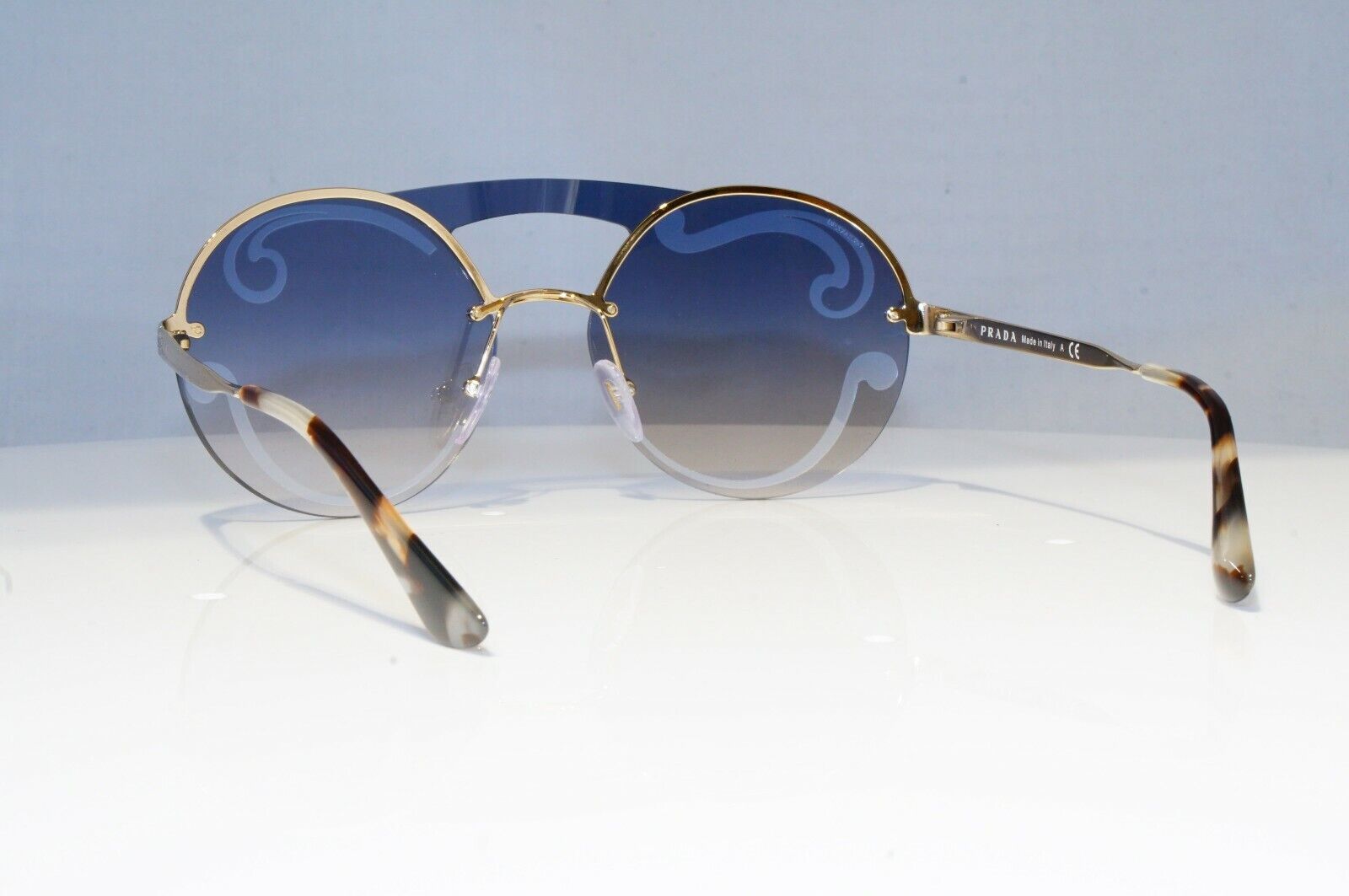 Prada Baroque Swirl Sunglasses Gold Blue Gradient Metal Round SPR 65T ZVN-0D0