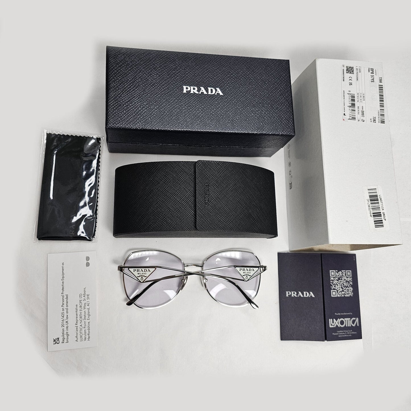 Prada Sunglasses Photochromic Grey Silver Triangle PR57YS SPR 57Y 1BC-07D