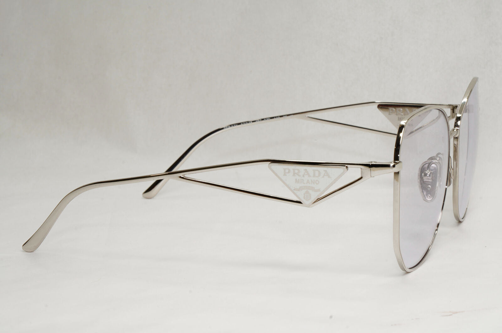 Prada Sunglasses Photochromic Grey Silver Triangle PR57YS SPR 57Y 1BC-07D