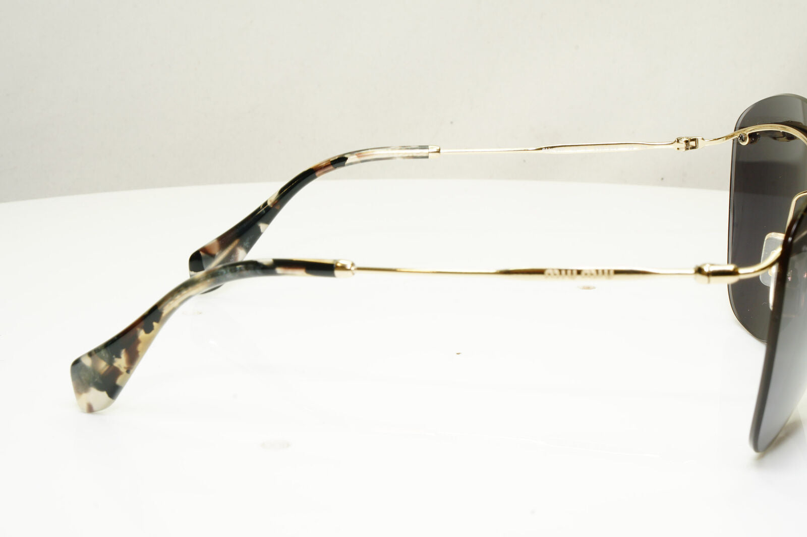 Authentic MIU MIU Womens Vintage Sunglasses Gold Rimless SMU 54P ZVN-3A2 30363
