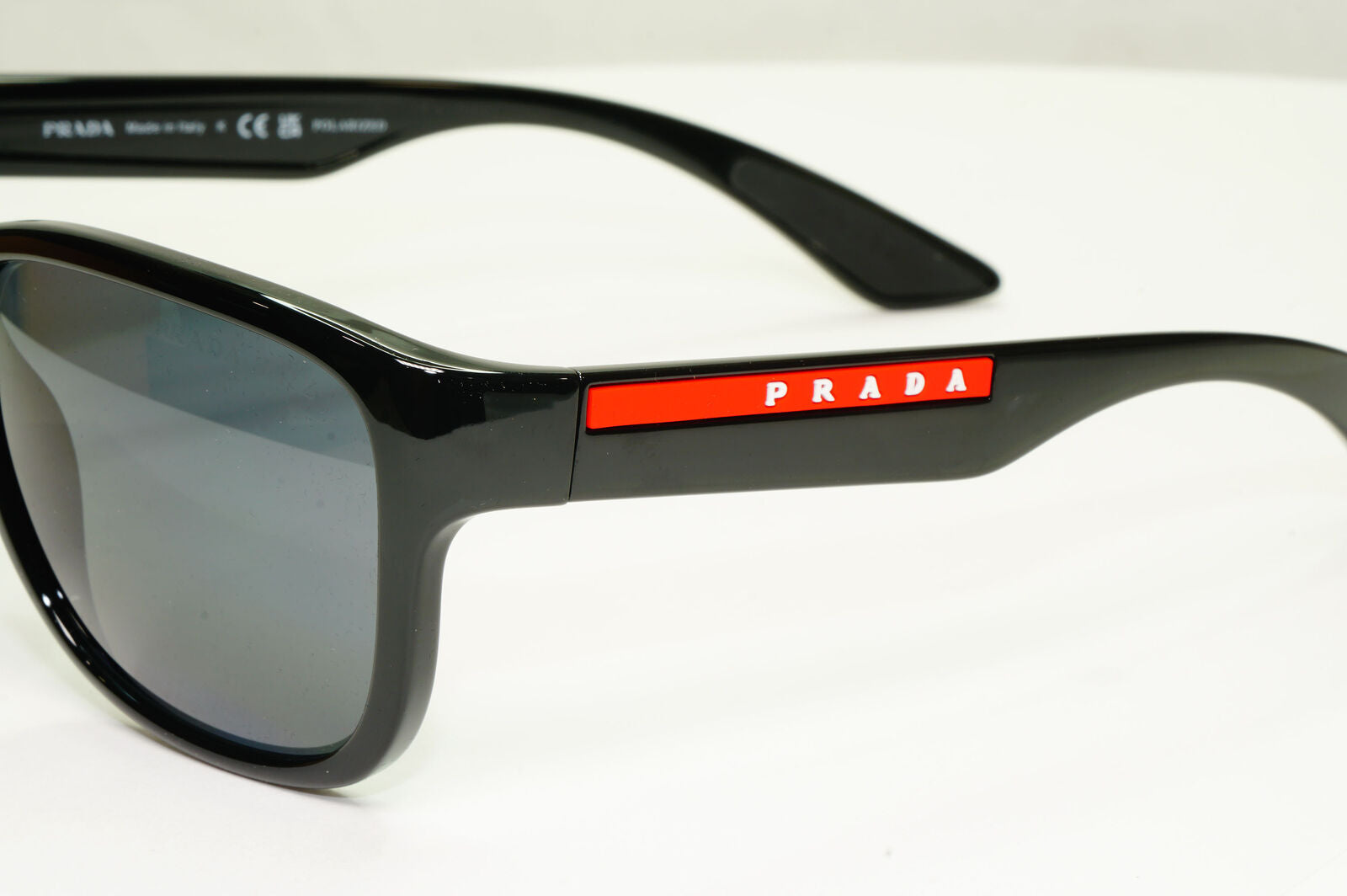 Prada Polarised Black Sunglasses Square Red Stripe PS01US SPS 01U 1AB-5Z1 59mm