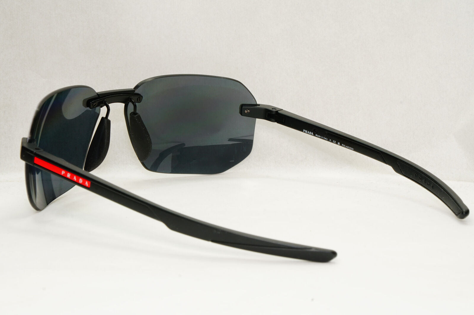 Prada Sunglasses Polarized Wrap Rimless Black PS09WS SPS 09W DG0-02G 62mm