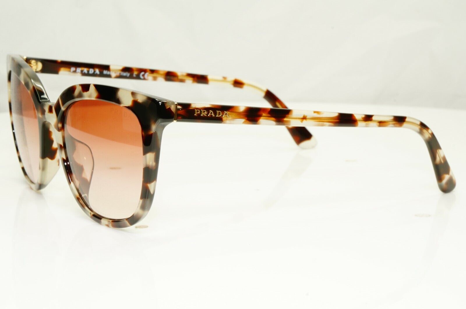 Prada Brown Tortoise Shell Womens Sunglasses Ultravox SPR 03X SF UA0-2F1 Turtle