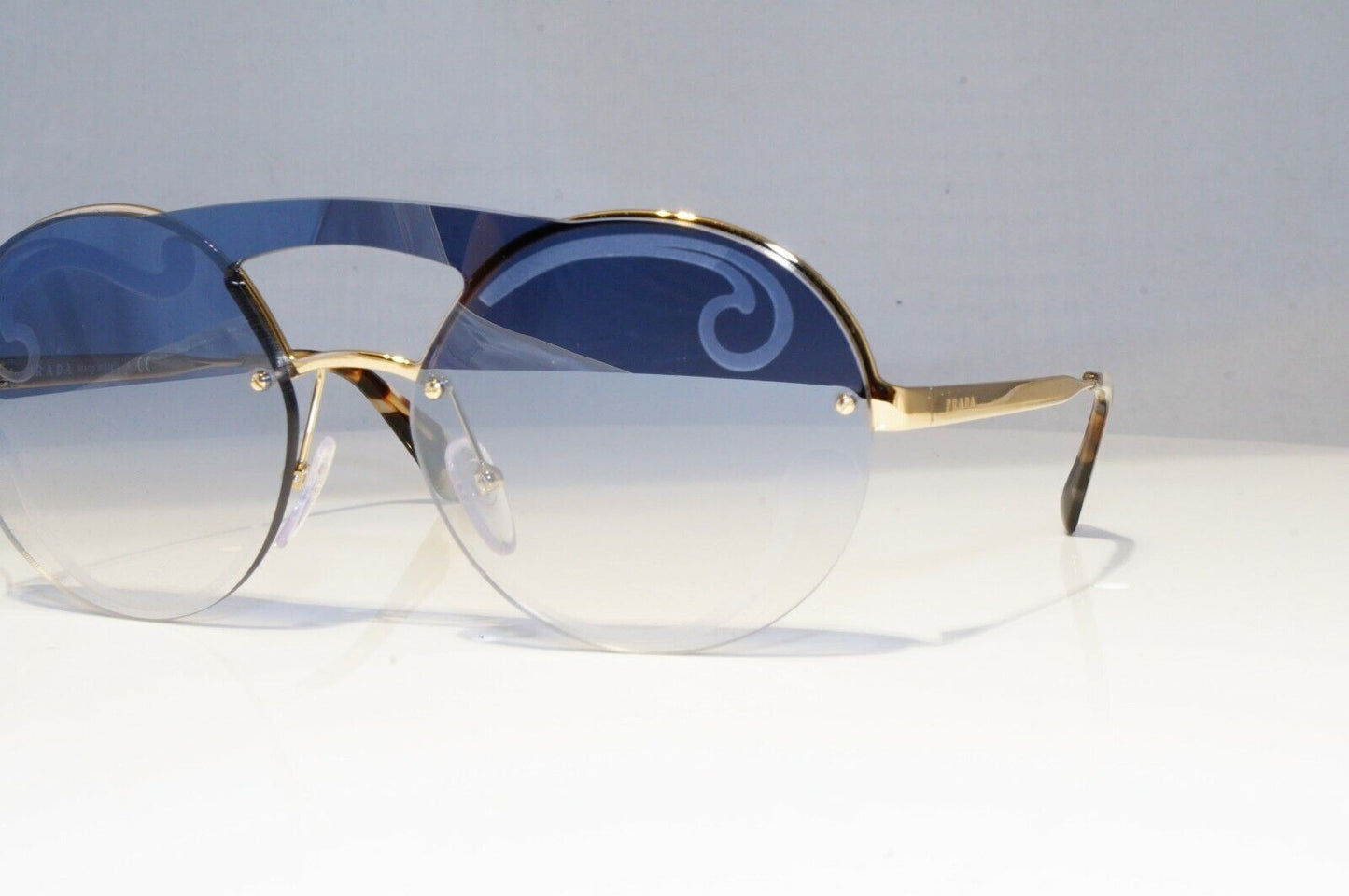Prada Baroque Swirl Sunglasses Gold Blue Gradient Metal Round SPR 65T ZVN-0D0