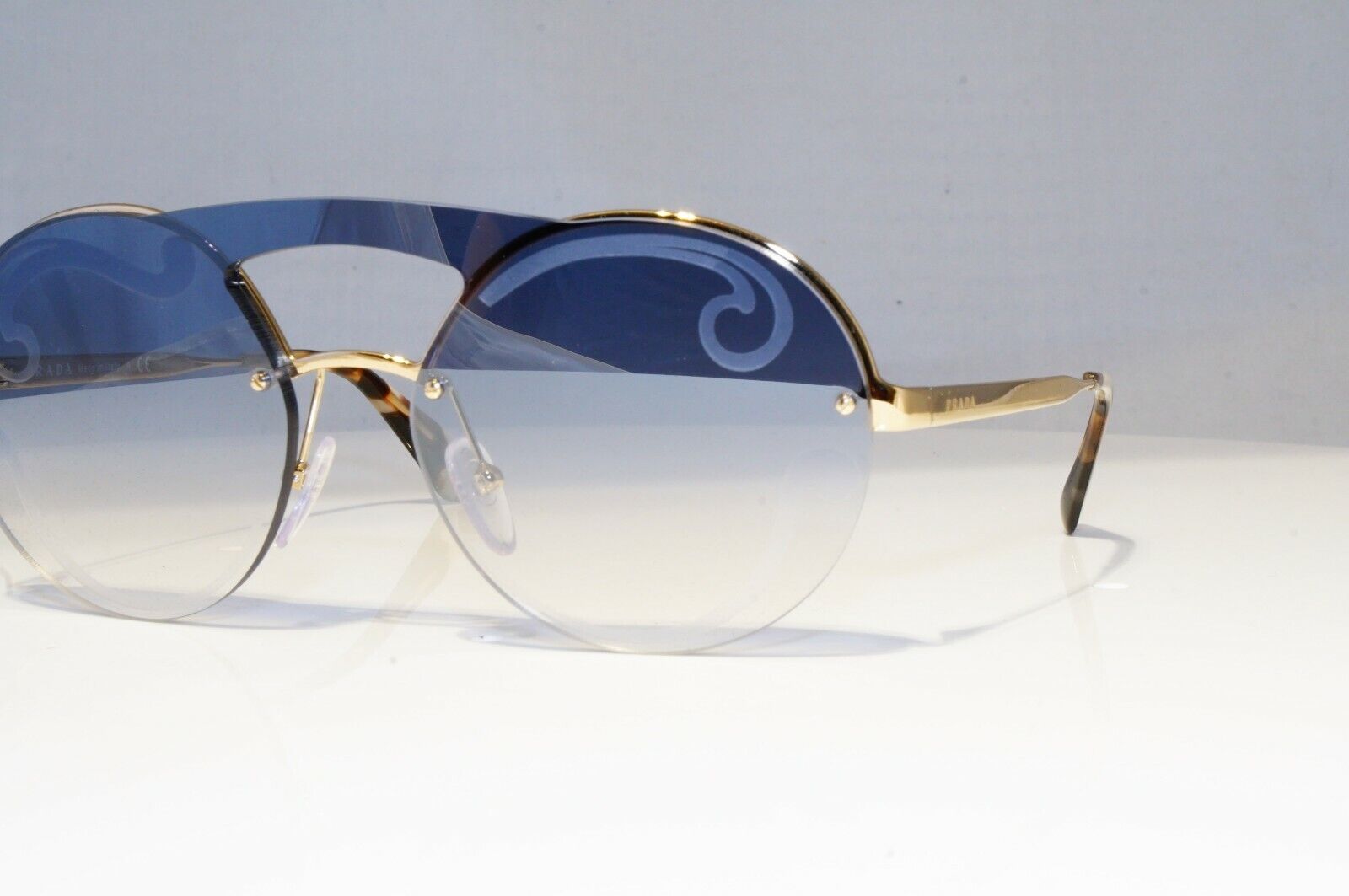 Prada Baroque Swirl Sunglasses Gold Blue Gradient Metal Round SPR 65T ZVN-0D0