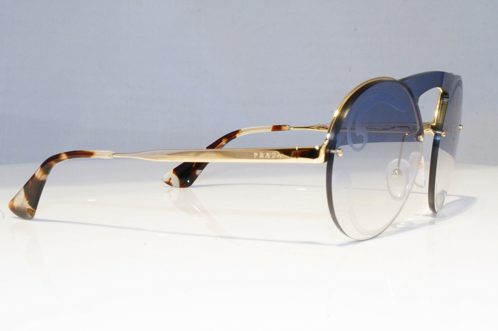 Prada Baroque Swirl Sunglasses Gold Blue Gradient Metal Round SPR 65T ZVN-0D0