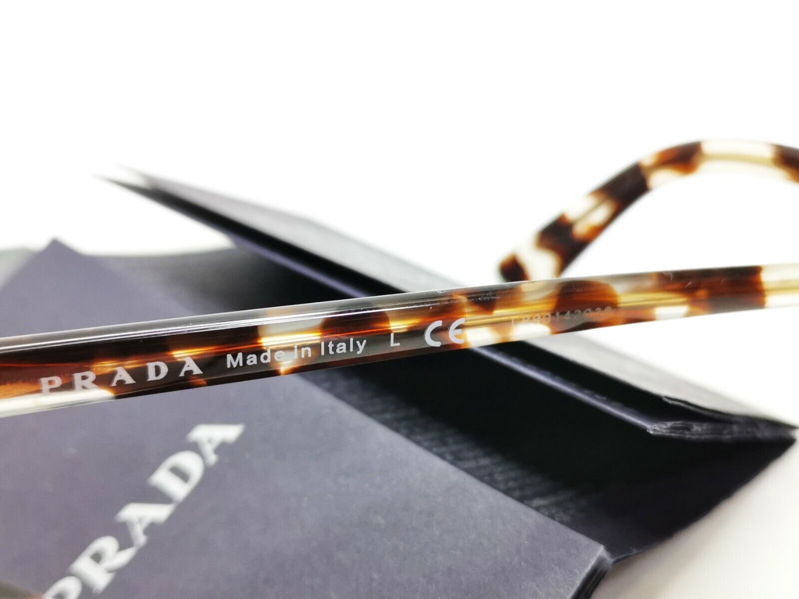 Prada Brown Tortoise Shell Womens Sunglasses Ultravox SPR 03X SF UA0-2F1 Turtle
