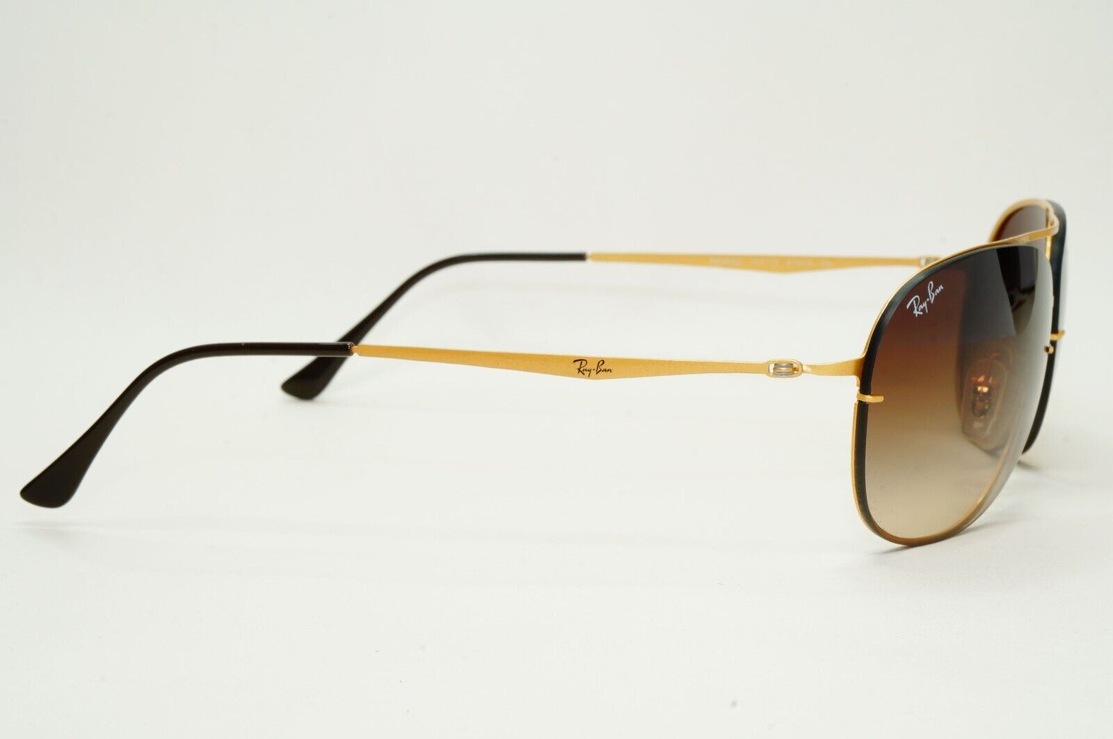 Ray-Ban Sunglasses Titan Ultra Lighweight Rimless Gold Brown RB 8052 157/13 61mm